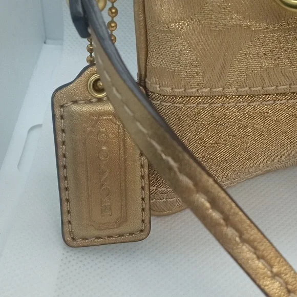 COACH SIGNATURE STUD WRISTLET - Picture 4 of 10